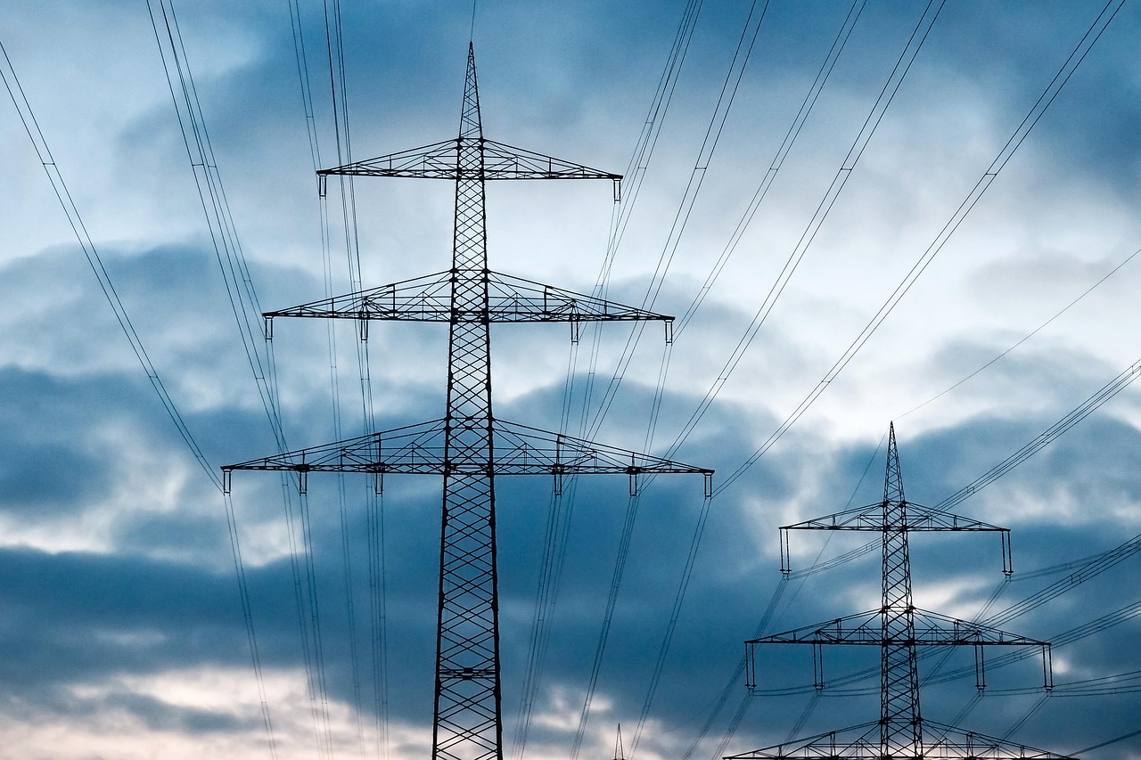 High-voltage transmission line pylons and electric grid infrastructure